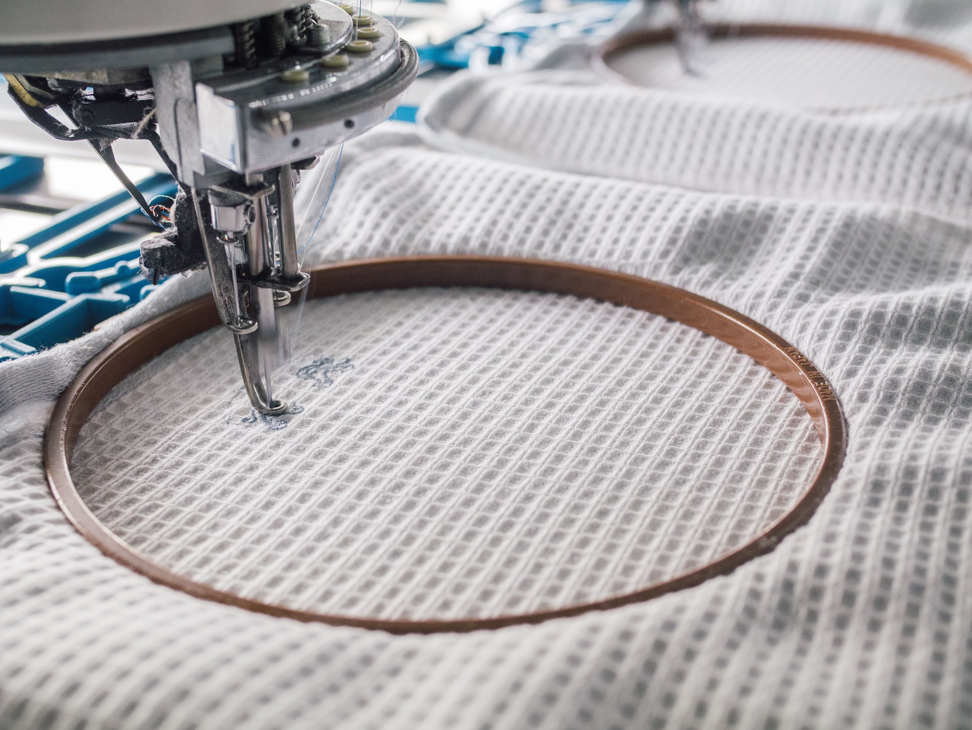 Industrial embroidery machine in the textile factory